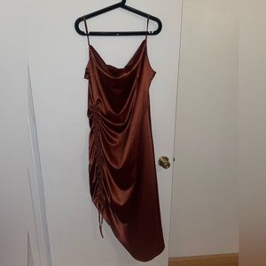 Satin copper draped dress perfect for a fun night out.